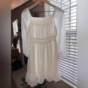 White sheet sleeved dress